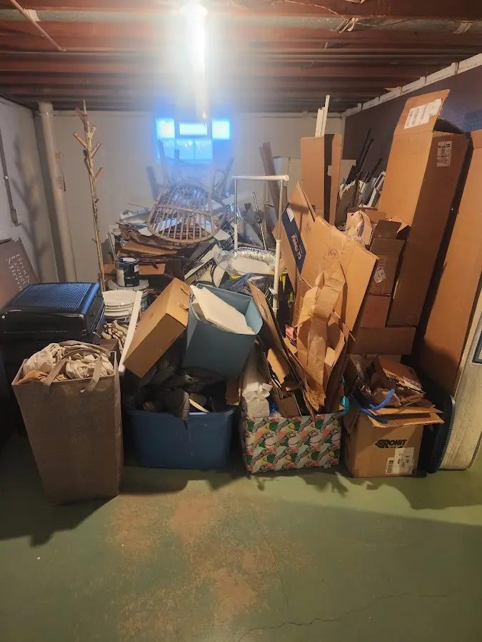 Roll-off dumpster container at job site for 2 Yard Dumpster Rental in Point Pleasant